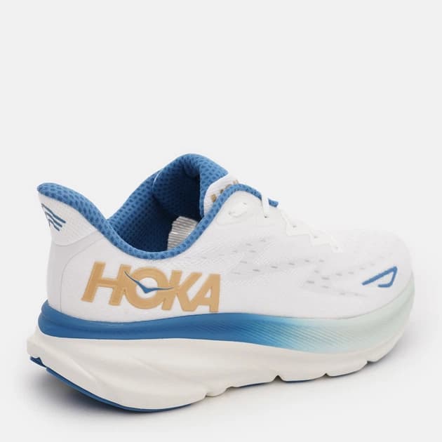 Tênis Hoka Clifton 9, cor branco/azul, vista traseira em ângulo