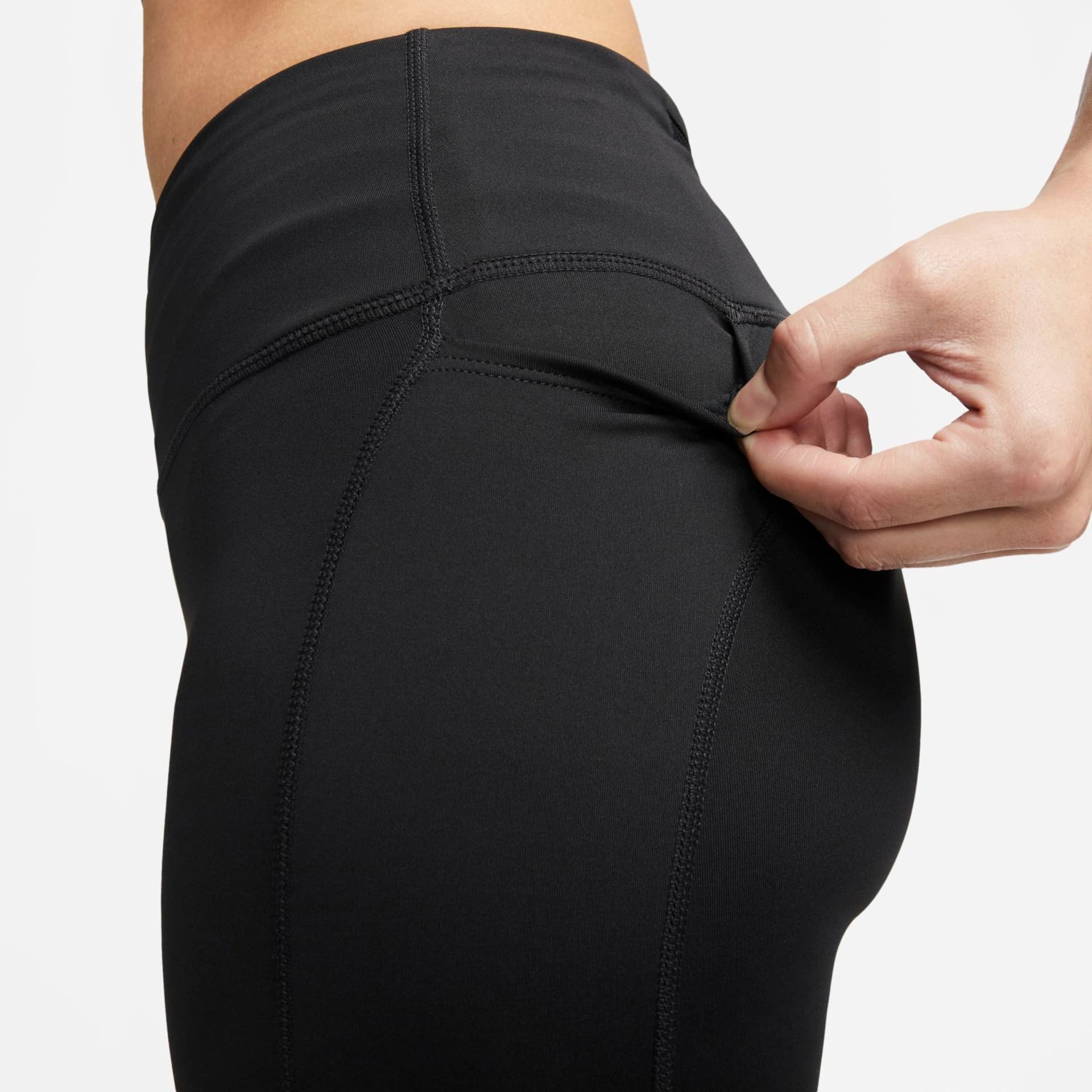Legging Nike Fast, cor preto, detalhe do bolso